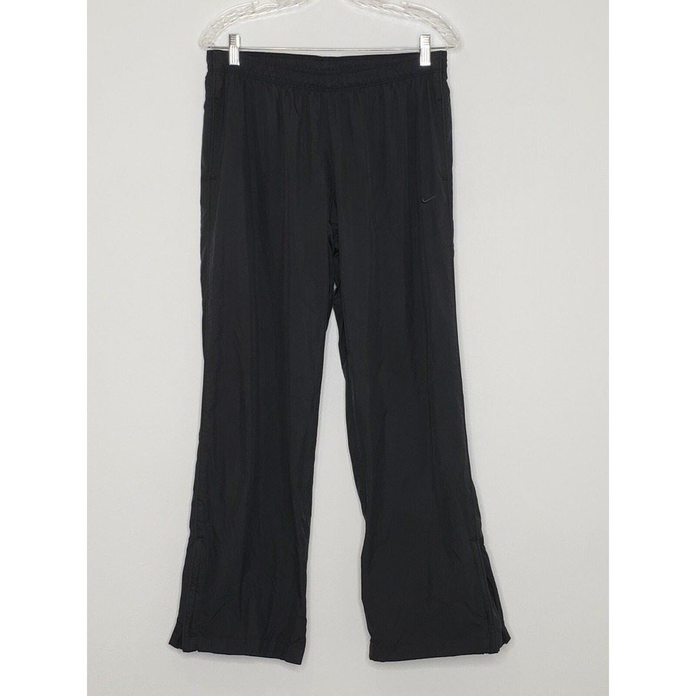 Nike‎ Womens Pants Large Solid Black Windbreaker Pockets Zip Ankle Elastic Waist